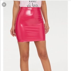 Pink vinyl mini skirt